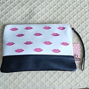Melie Bianco black and white pink lip wristlet purse